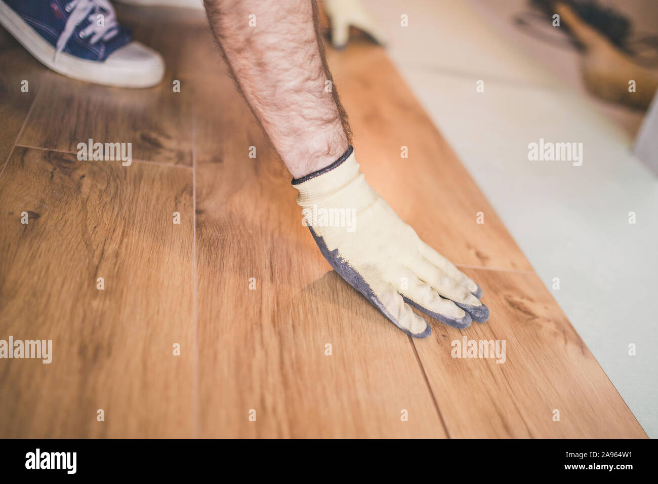 Professional Flooring Installation Laying A New Laminate With A