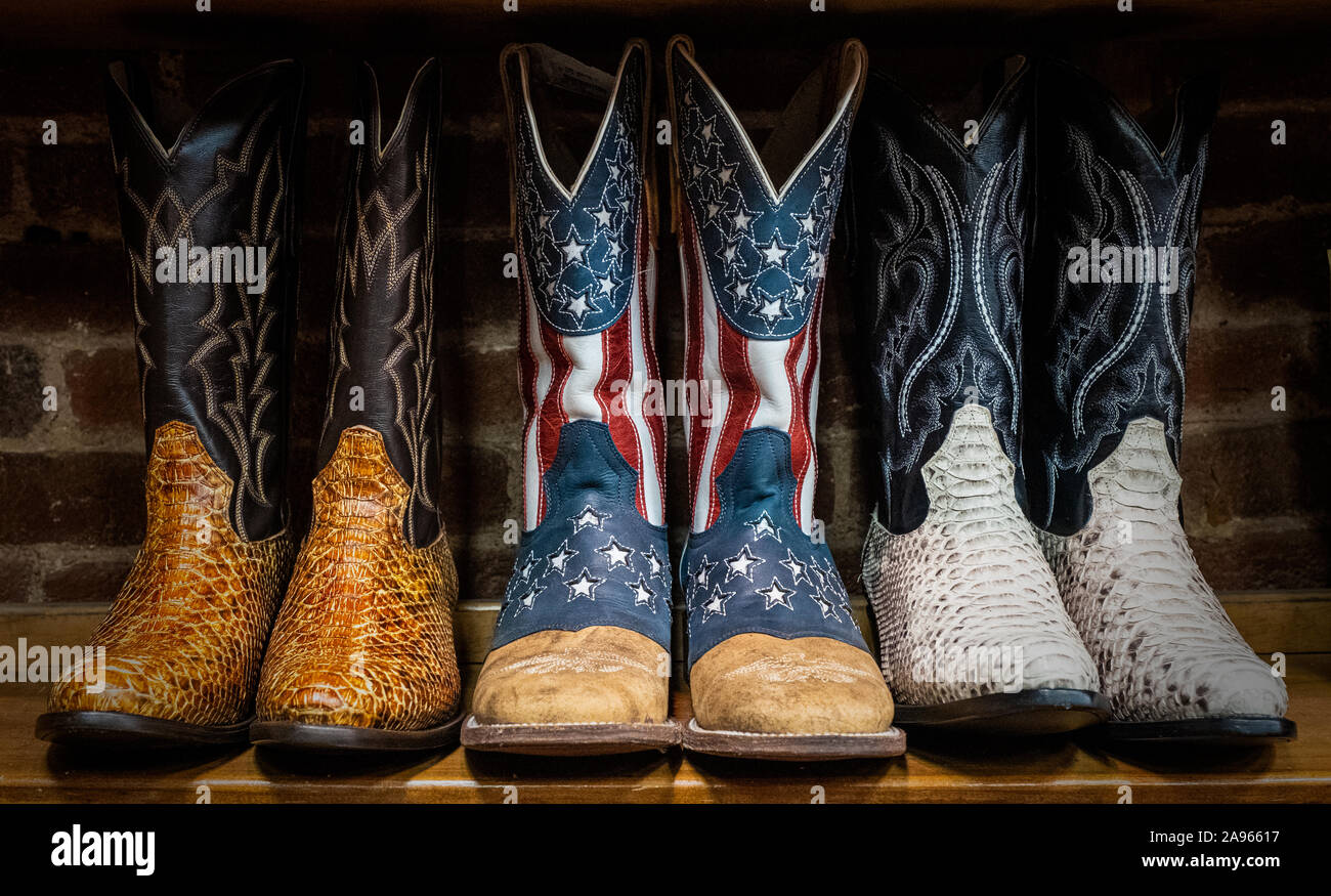 Cowboy boots decorated with the American flag on sale in shops in downtown Nashville, Tennessee. Stock Photo