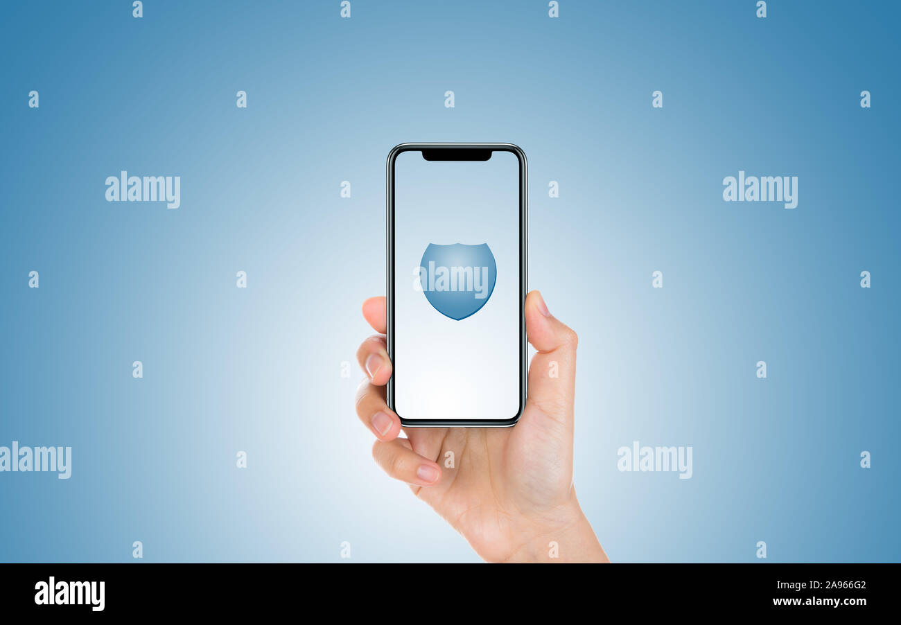Male hand is holding and showing us a modern smart phone screen with ...