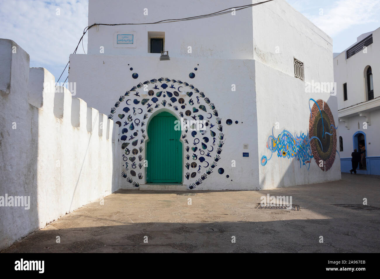 Asilah, Morocco-September 10, 2019: A decorated door in the village of Asilah in Morocco near the rampart in the medina Stock Photo