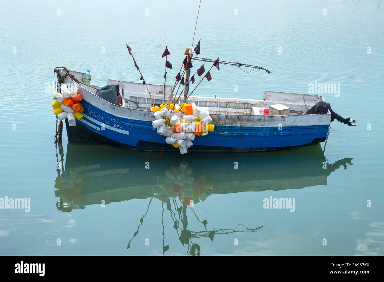 Asilah, Morocco-September 10, 2019: Traditional blue fishing boat in the harbour of Asilah, Morocco Stock Photo