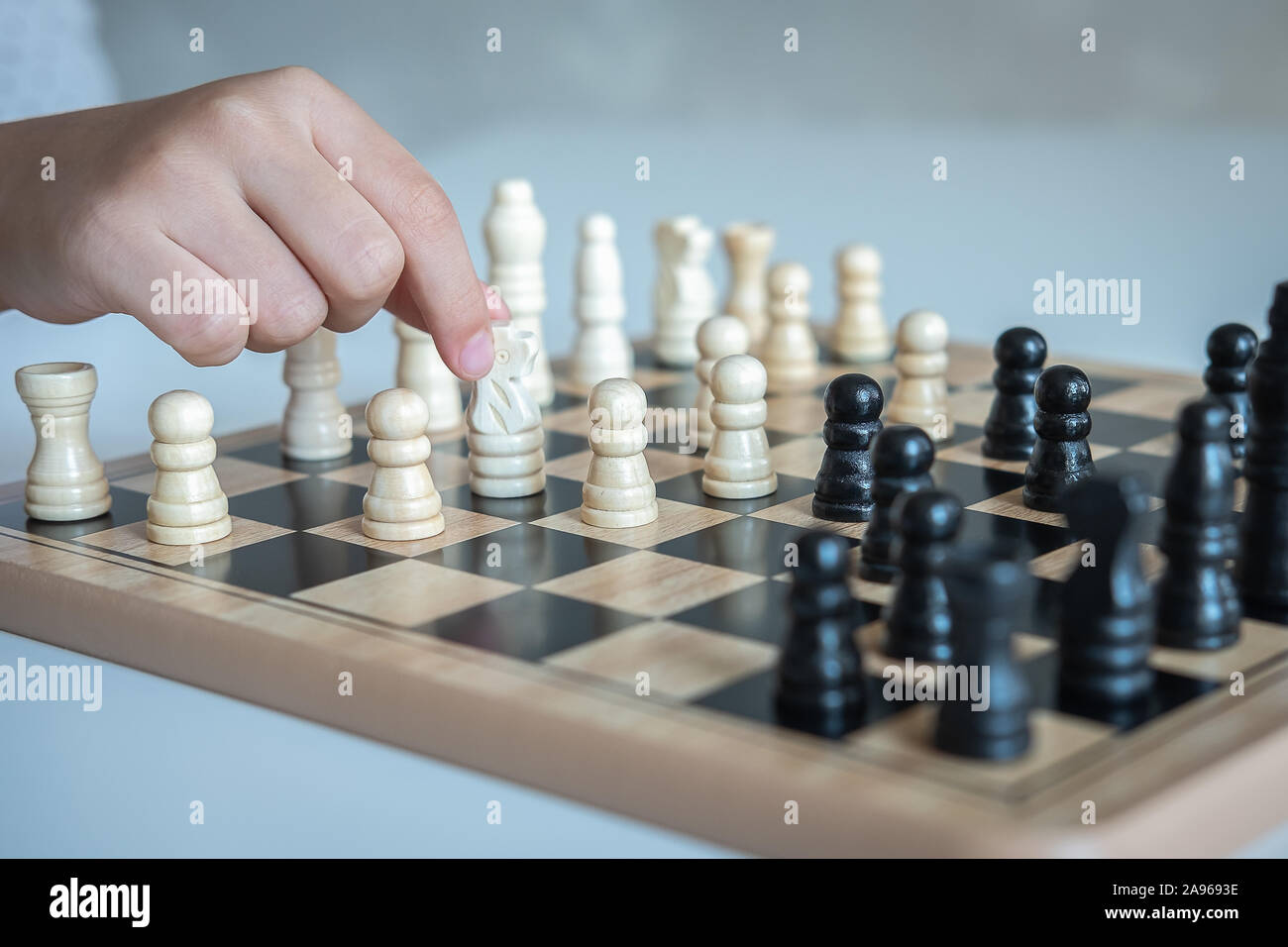 A Girl Learn How To Play Chess Game Stock Photo Alamy