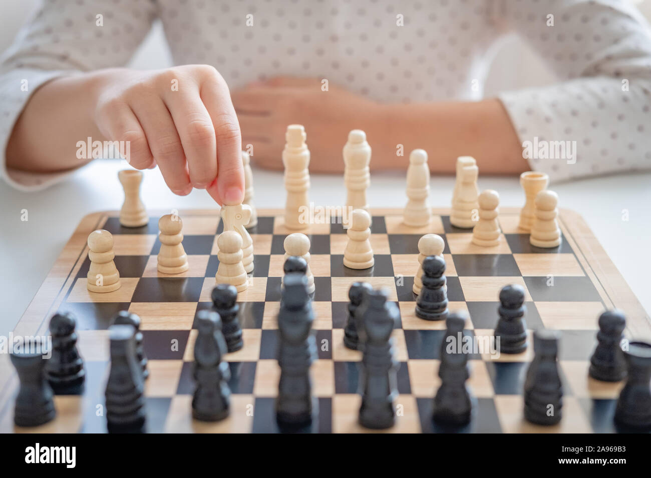 A Girl Learn How To Play Chess Game Stock Photo Alamy