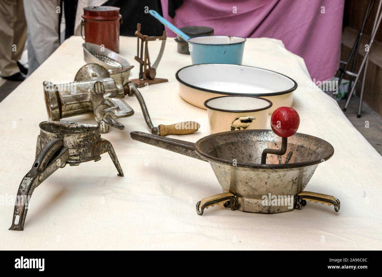 Aluminum utensils in a medieval market in Pamplona, Spain Stock Photo