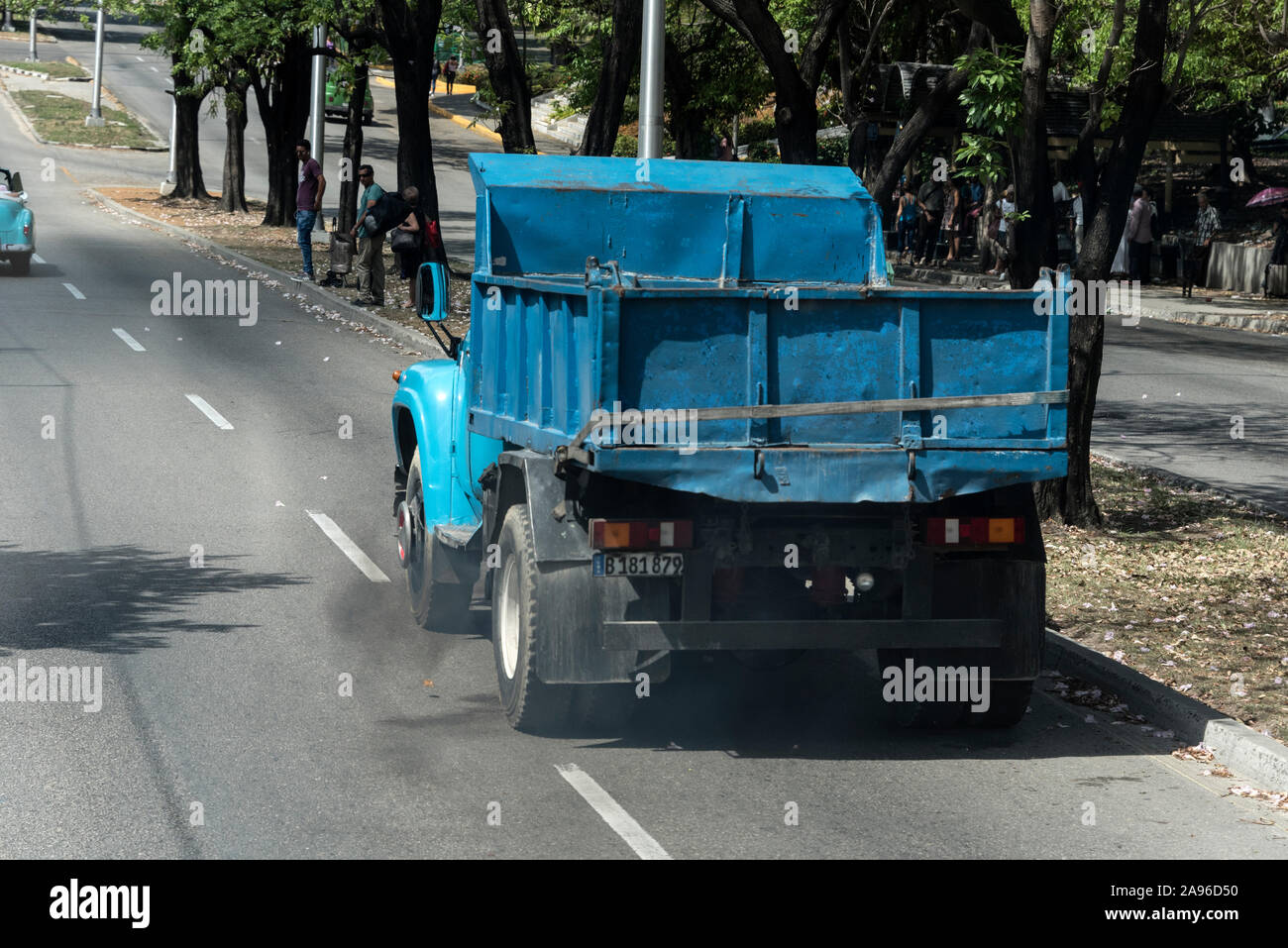 One of the many trucks and buses on the roads of Havana in Cuba, belching out thick diesel fumes due to lack of vehicle maintenance and poor fuel qua Stock Photo