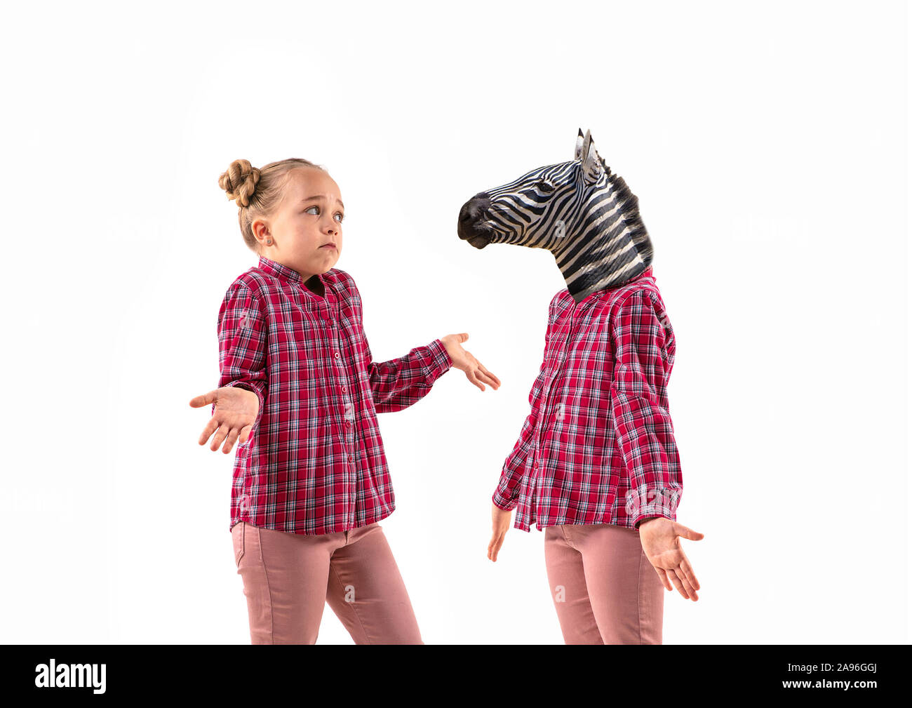 Zebra Hand Some Young handsome girl arguing with herself as a zebra on white studio ...