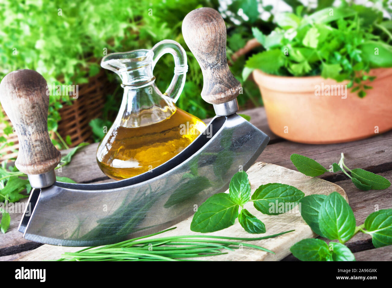 Fresh herbs and chopping knife Stock Photo Alamy