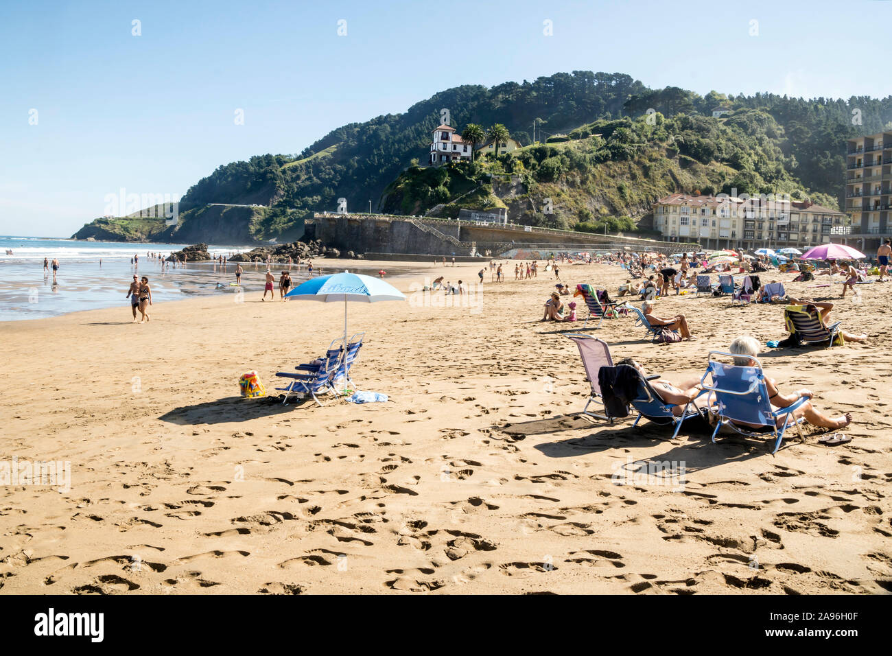 Zumaya, Spain-September 2018.People sunbathing on the beach in spanish basque country on a sunny day Stock Photo