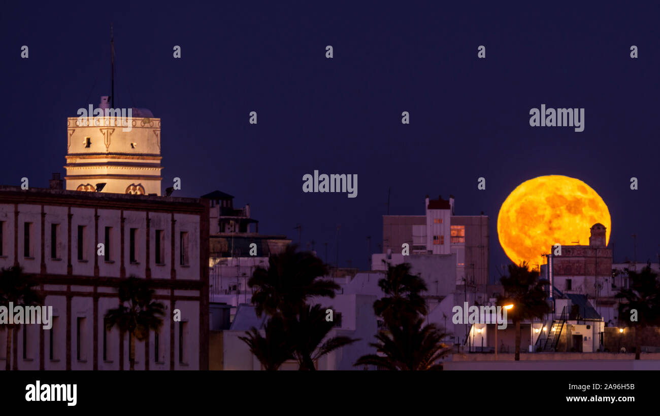 Tavira Tower and Full Moonrise Cadiz Andalusia Spain Stock Photo