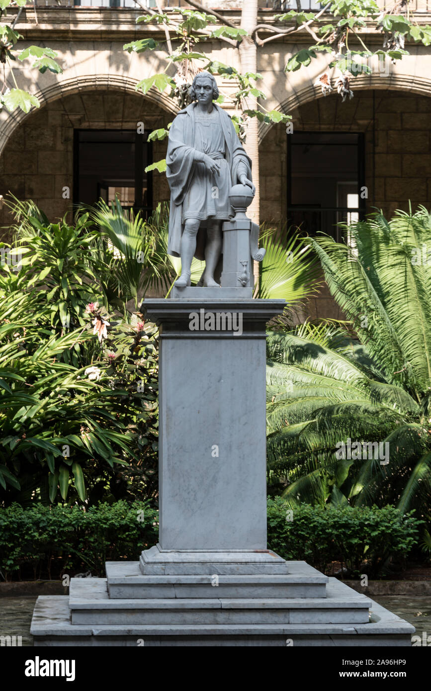 In the courtyard, is a statue of Christopher Columbus who discovered Cuba in 1519. It is at the Palacio de los Capitanes Generales (Havana’s history m Stock Photo