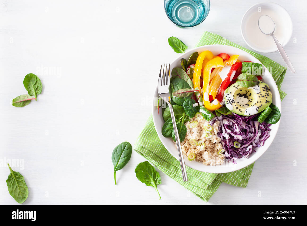 veggie couscous lunch bowl with avocado, bell peppers, spinach and red cabbage Stock Photo Alamy