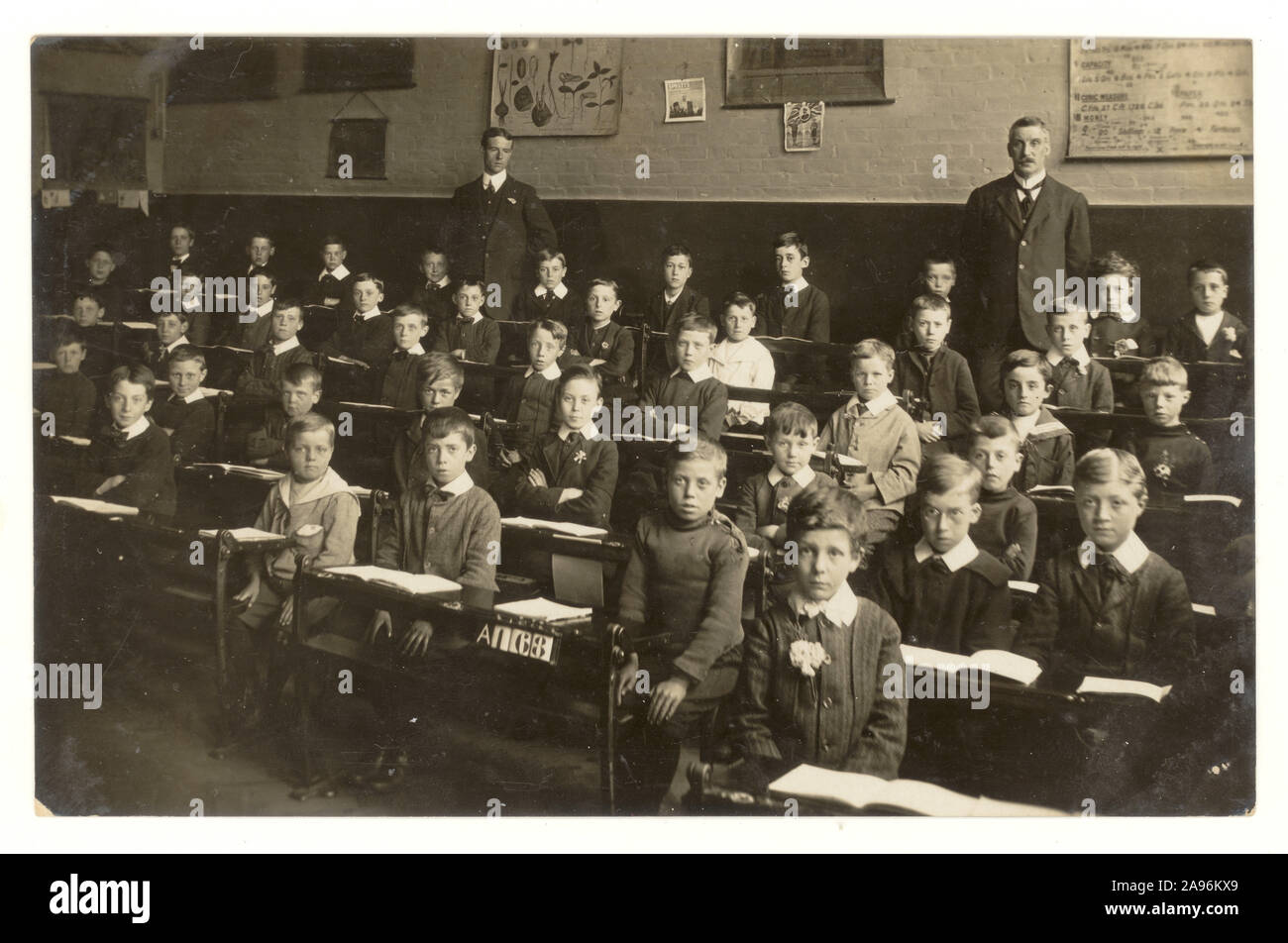 Original early 1900's school boys sitting in classroom, circa 1910,  studio of J.& G Taylor, Green Lane, N. London, U.K. Stock Photo