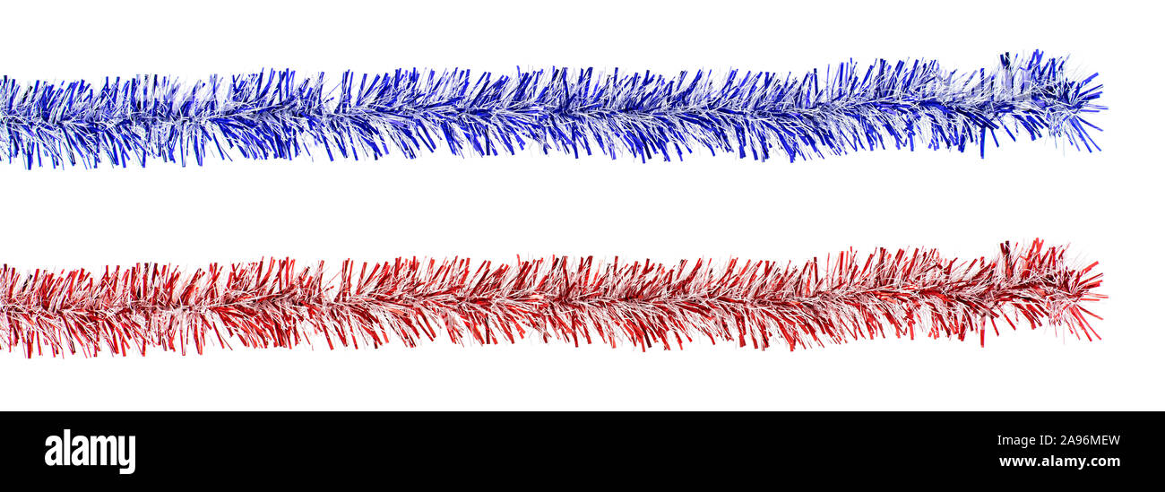 Festive holiday banner of a garland of isolated red and blue Christmas tinsels on a white background Stock Photo