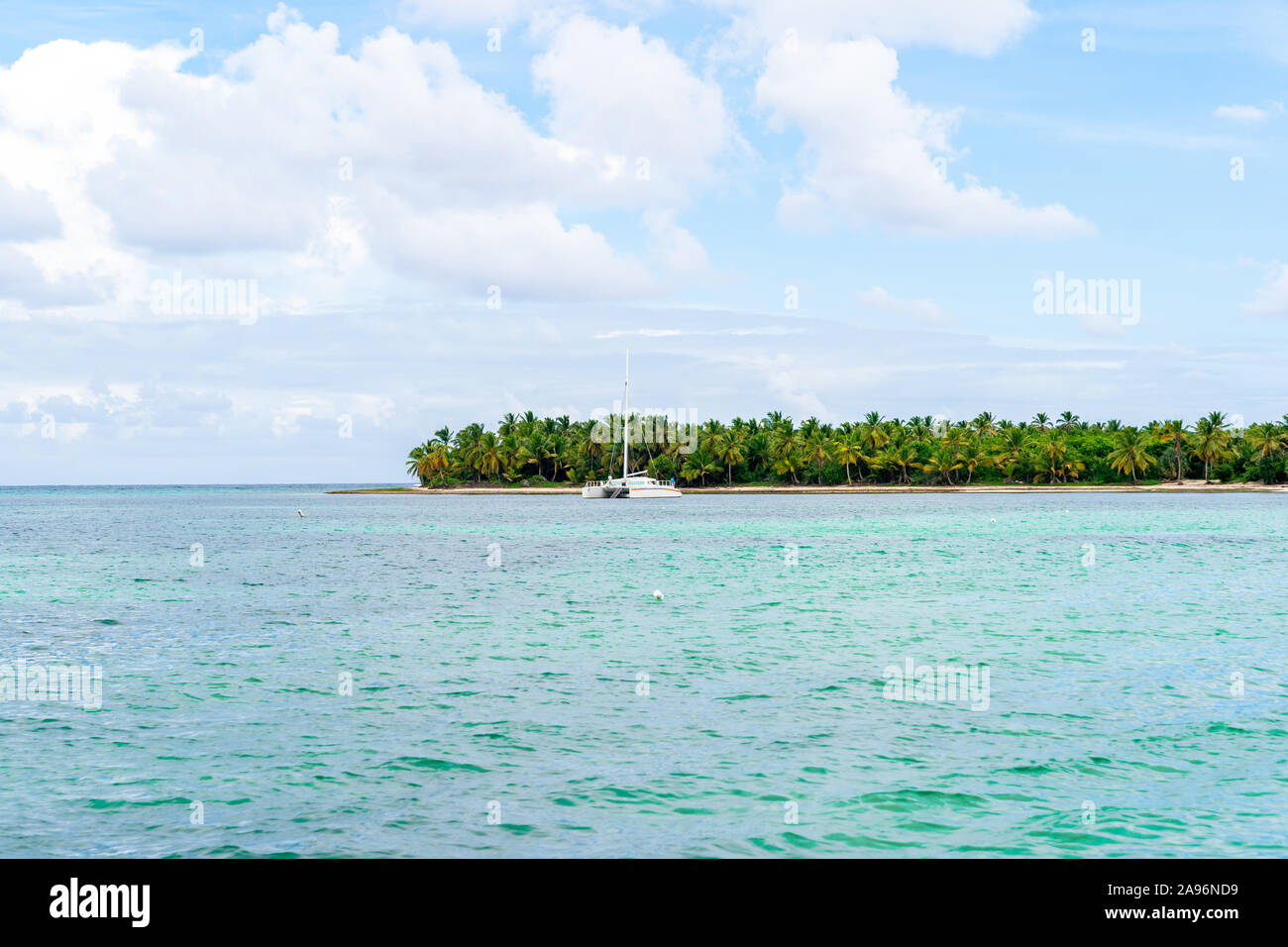 Scenic Ocean Waters with a Catamaran Boat. Stock Photo