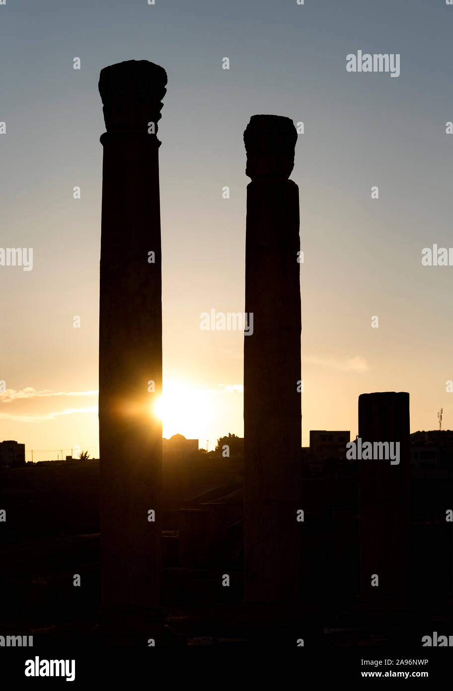 Columns of the courtyard of Sanctuary of Artemis at sunset, Jerash, Jordan Stock Photo