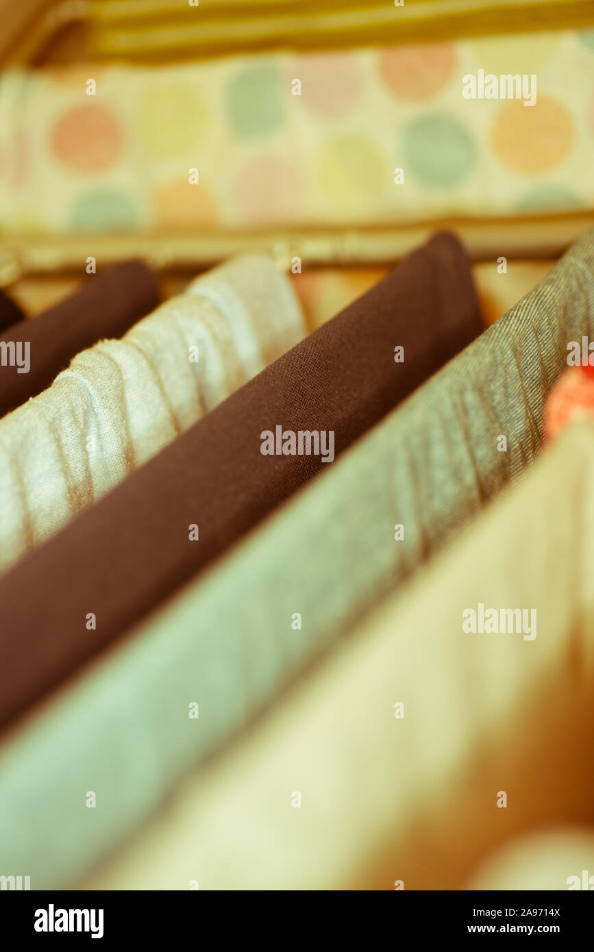 Colourful laundry drying on airer inside the house Stock Photo