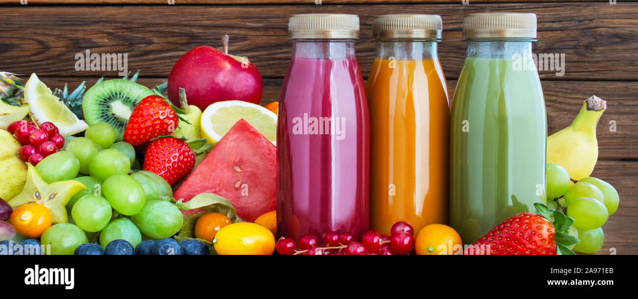 Smoothie Bottles And Fruits Stock Photo Alamy