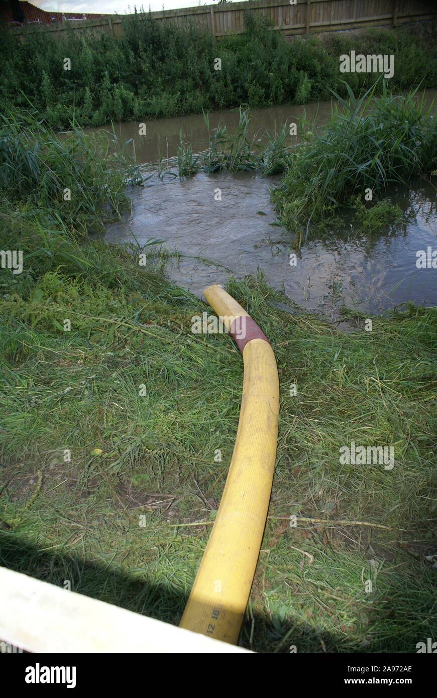 flood disaster zone, water pumping equipment Stock Photo