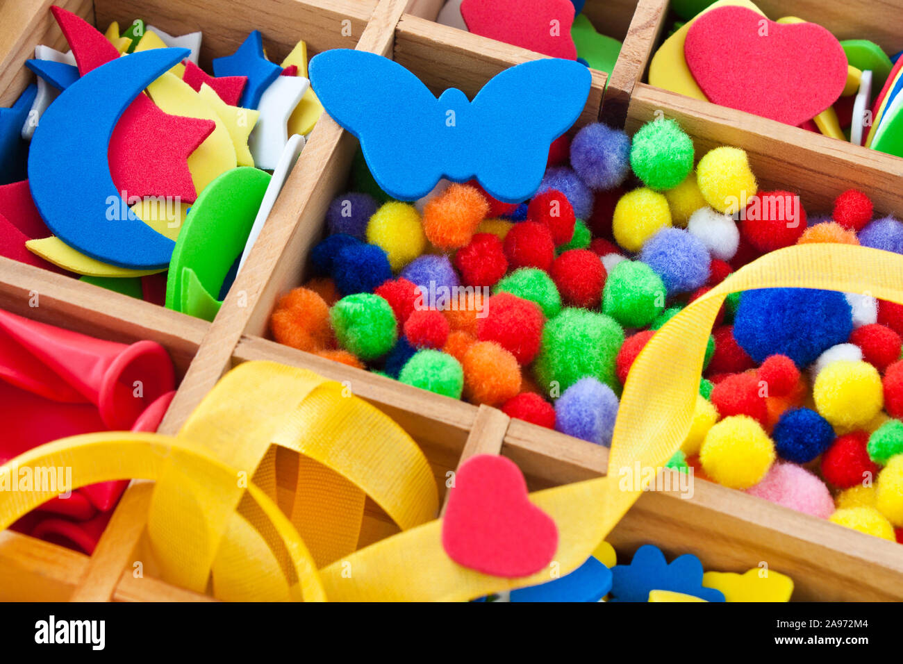 Colorfull accessories in a wooden box Stock Photo
