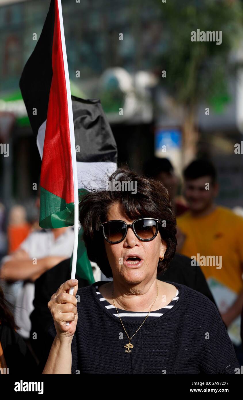 (191113) -- NABLUS, Nov. 13, 2019 (Xinhua) -- A Palestinian takes part in a protest in solidarity with Palestinians under the Israeli military offensive on the Gaza Strip, in the West Bank City of Nablus, Nov. 13, 2019. The new wave of violence broke out on Tuesday after Israel killed senior Islamic Jihad militant Baha Abu al-Atta and his wife in an airstrike on his house in eastern Gaza City. (Photo by Ayman Nobani/Xinhua) Stock Photo