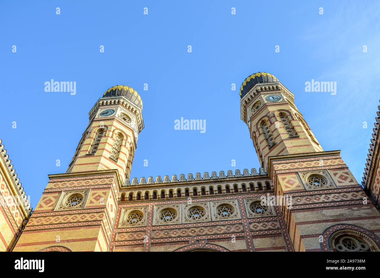 Front side facade of the Great Synagogue in Hungarian Budapest. Dohany Street Synagogue, the largest synagogue in Europe. Centre of Neolog Judaism. Ornamental facade and two onion domes. Tourist spot. Stock Photo