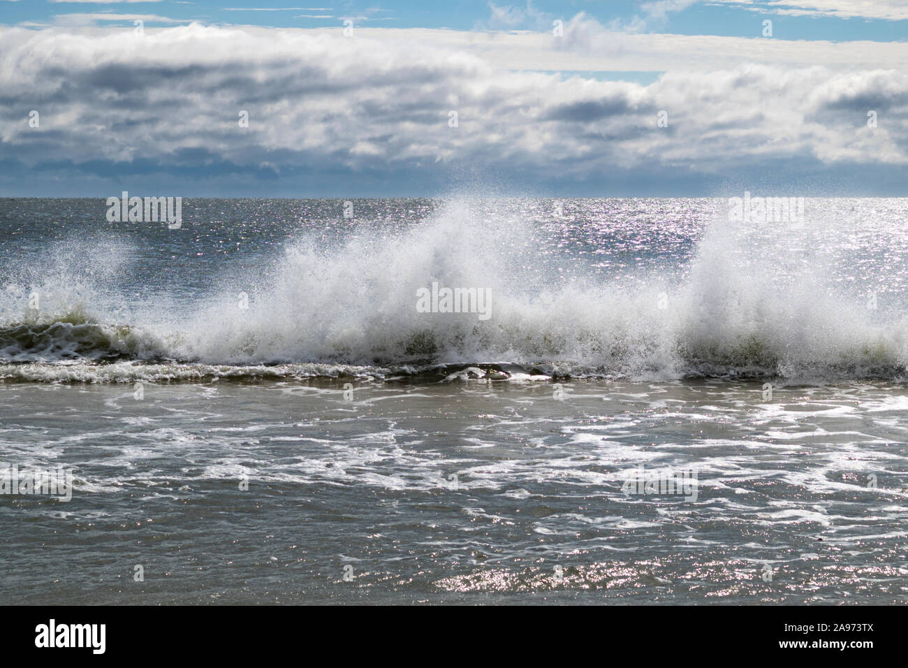 Wind-swept waves crash onto the beach at Gulf Shores, Alabama, USA Stock Photo