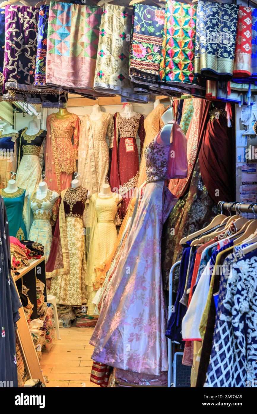Colourful Asian and Indian dresses, saris and fashion on display in shop,  Southall High Street, London, UK Stock Photo - Alamy