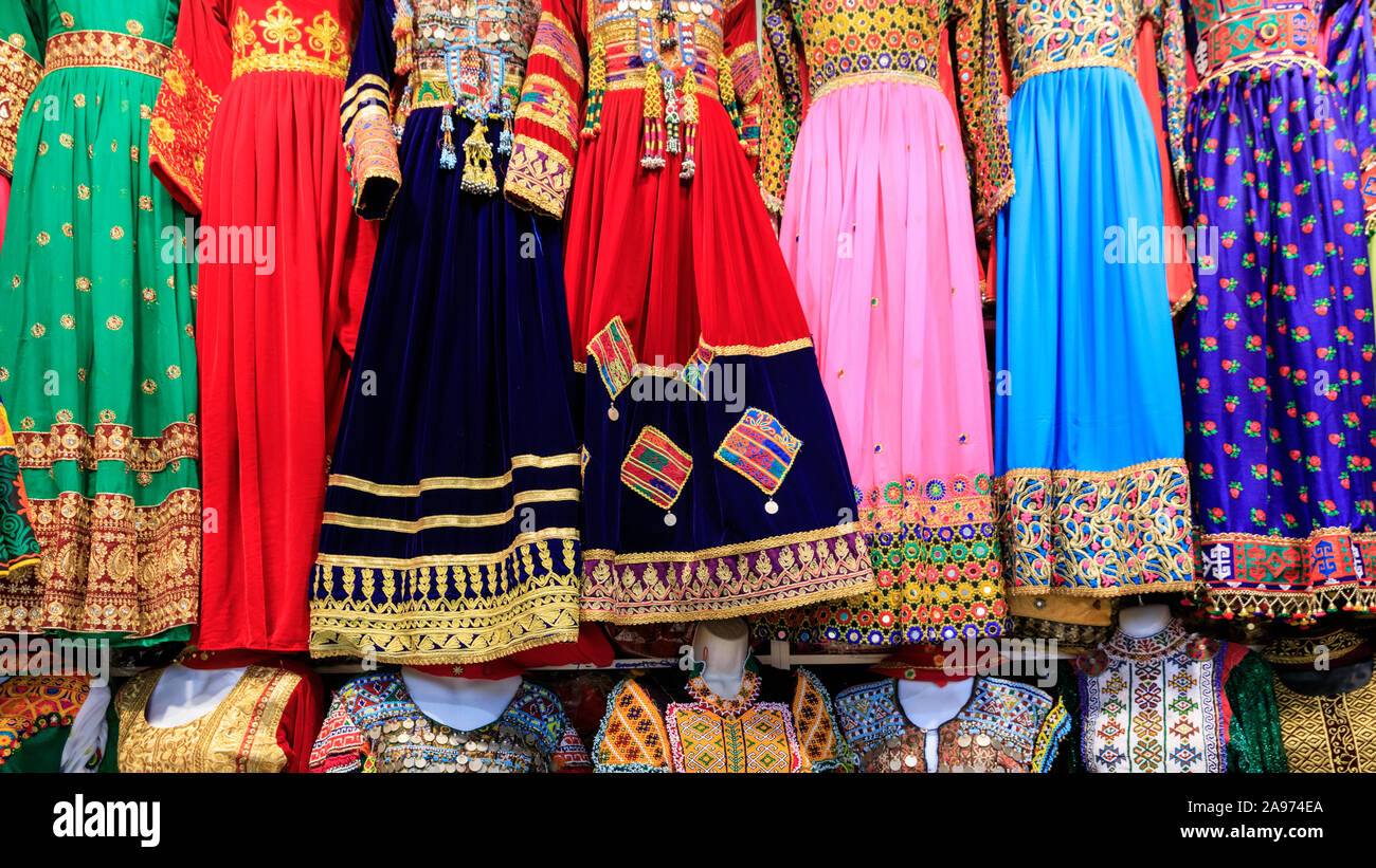 Afghani traditional dresses and colourful Afghan Asian clothing in shop display Stock Photo