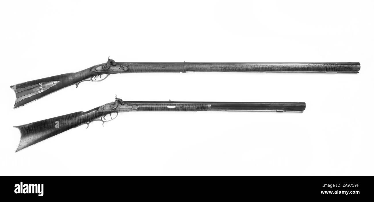 Antique mountain mans rifles. One is full stock and the other is half stock made around 1840. Stock Photo