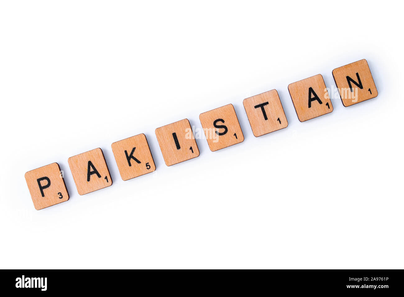 London, UK - July 8th 2019: The word PAKISTAN, spelt with wooden letter tiles over a white background. Stock Photo