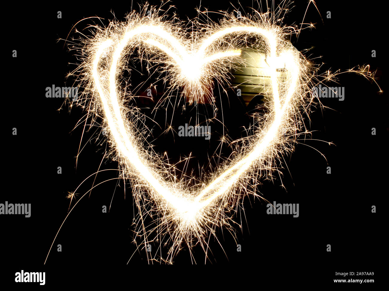 Love heart sparks hi-res stock photography and images - Alamy