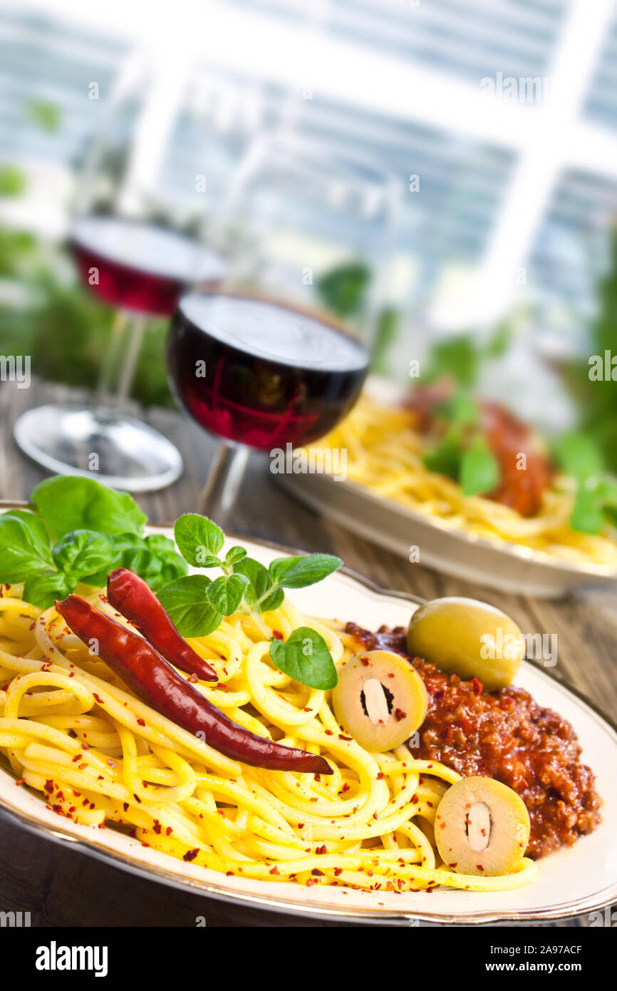 Spaghetti Bolognese and red wine close up Stock Photo Alamy