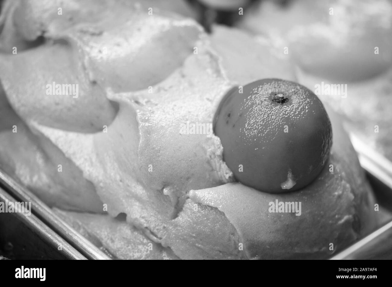 delicious italian ice-cream wit fresh fruits & mix of nuts, seeds, pistachio, chocolate flakes Stock Photo