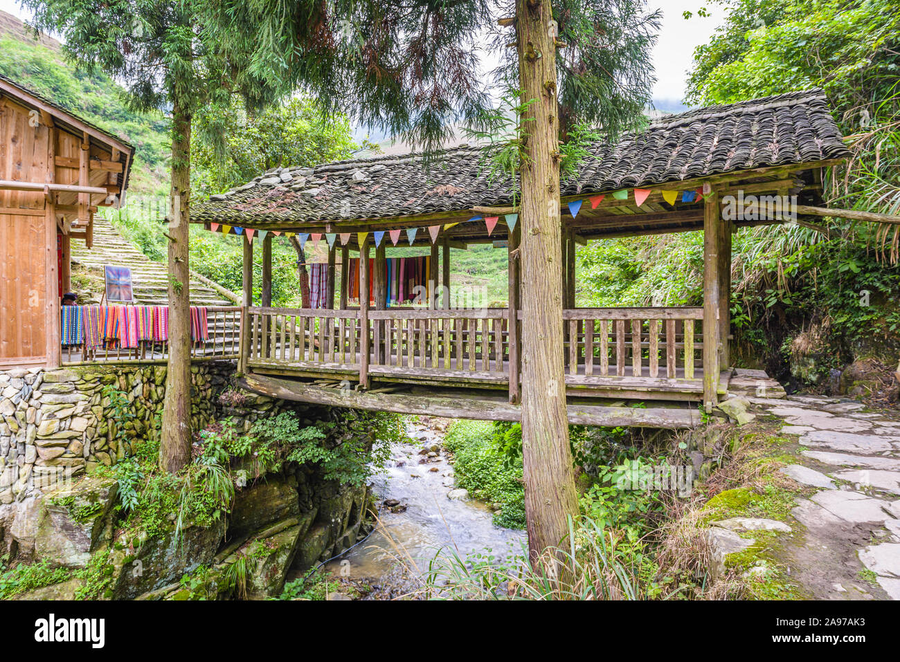 Guilin, China covered bridge on the walking trails. Stock Photo