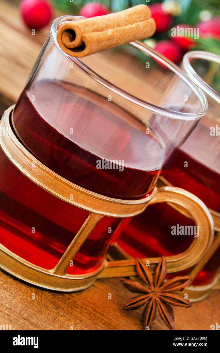 Hot spiced wine and cinnamon Stock Photo