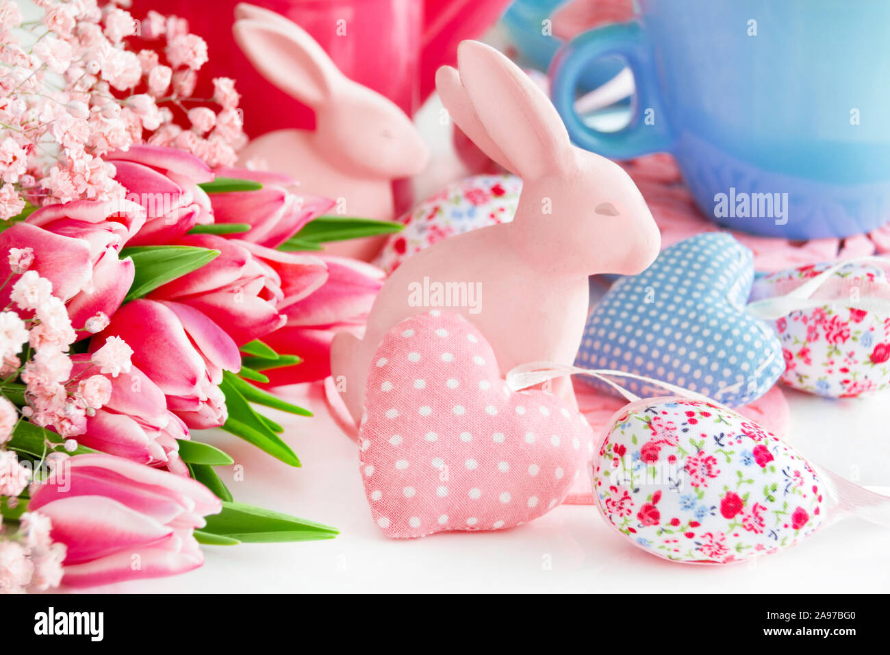 Easter bunny decoration and tulips with eggs Stock Photo - Alamy