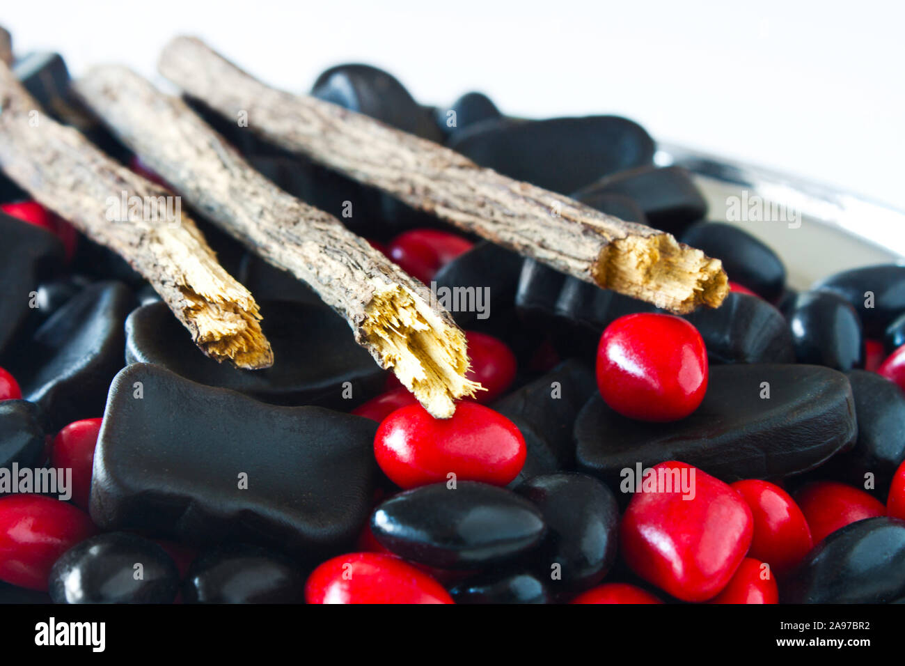 Licorice candy and root close up Stock Photo