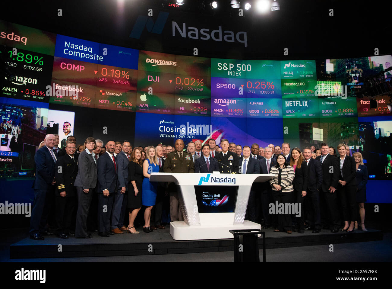 U.S Defense Secretary Mark Esper, center, alongside superintendent of the U.S. Military Academy, Army Lt. Gen. Darryl Williams, and the superintendent of the U.S  Naval Academy, Navy Vice Adm. Sean Buck, right, rings the closing NASDAQ bell in honor of Veterans Day November 11, 2019 n New York City, New York. Stock Photo