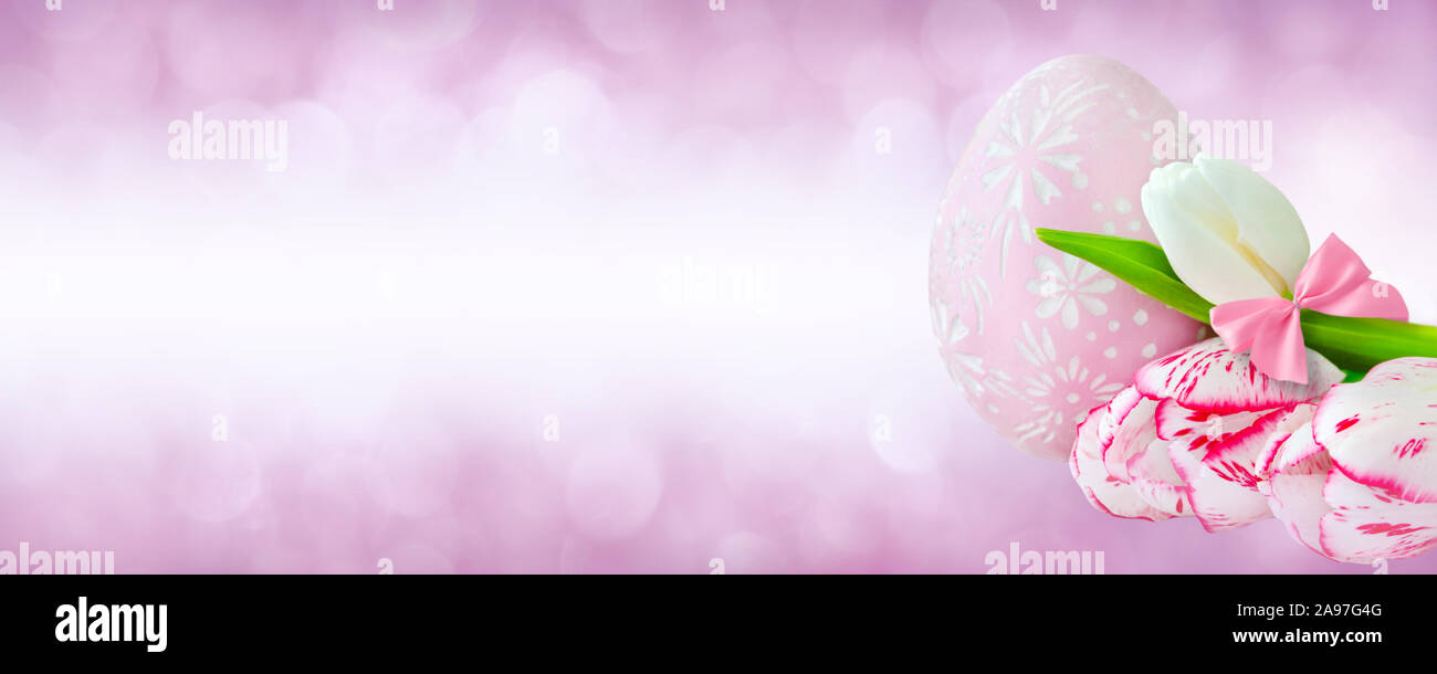 Pink Easter decoration eggs and tulips Stock Photo - Alamy
