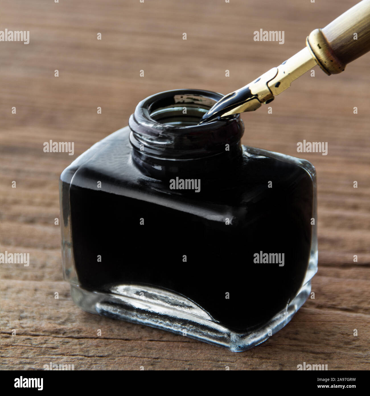 Ink pot and feather Stock Photo Alamy