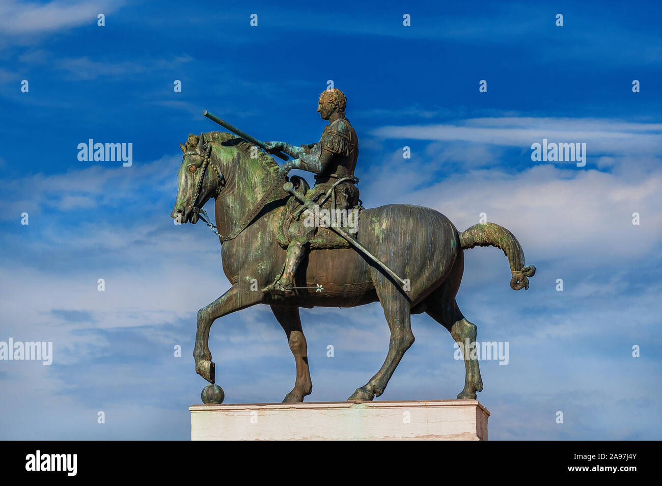 Gattamelata bronze equestrian statue among clouds, in the historic center of Padua, erected by the famous renaissance artist Donatello in 1453 Stock Photo