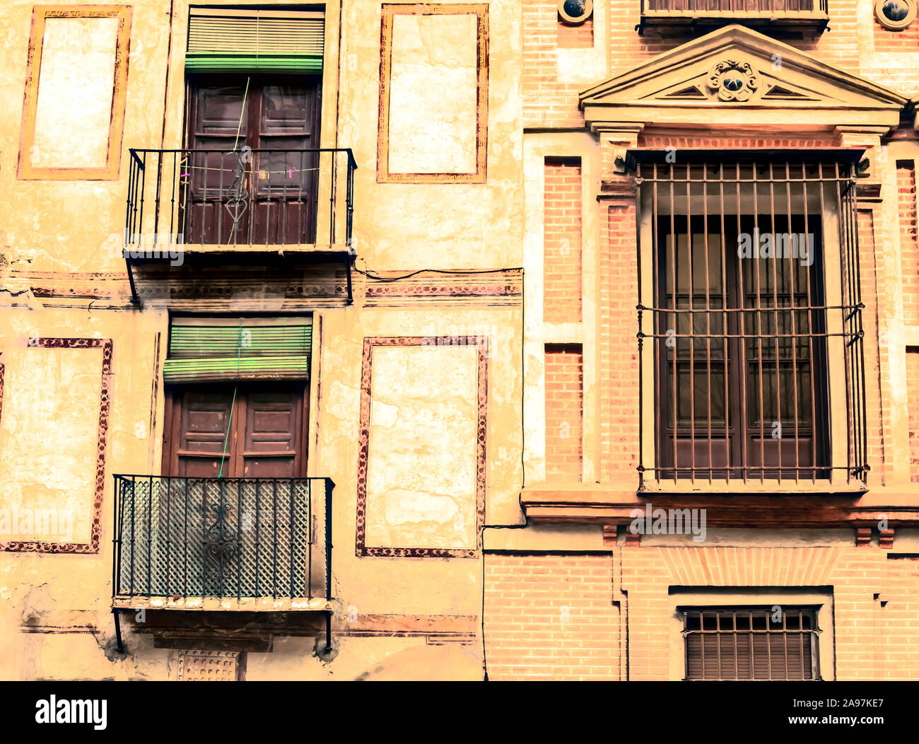 Louvered windows on the facade of an old house in the spanish city of