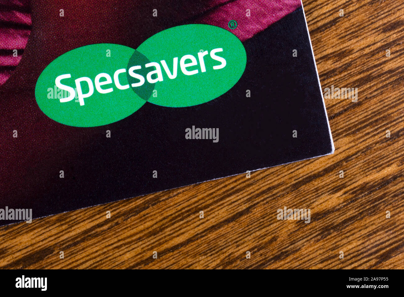 London, UK - March 7th 2019: The company logo of Specsavers, pictured on a leaflet.  Specsavers Optical Group Ltd is a British optical retail chain. Stock Photo