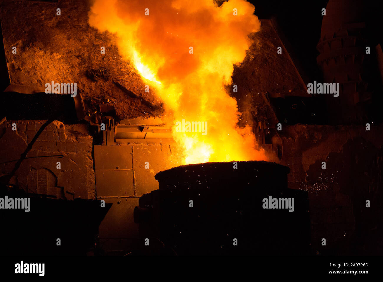 Heated metal pig gets squeezed and drilled at special metal