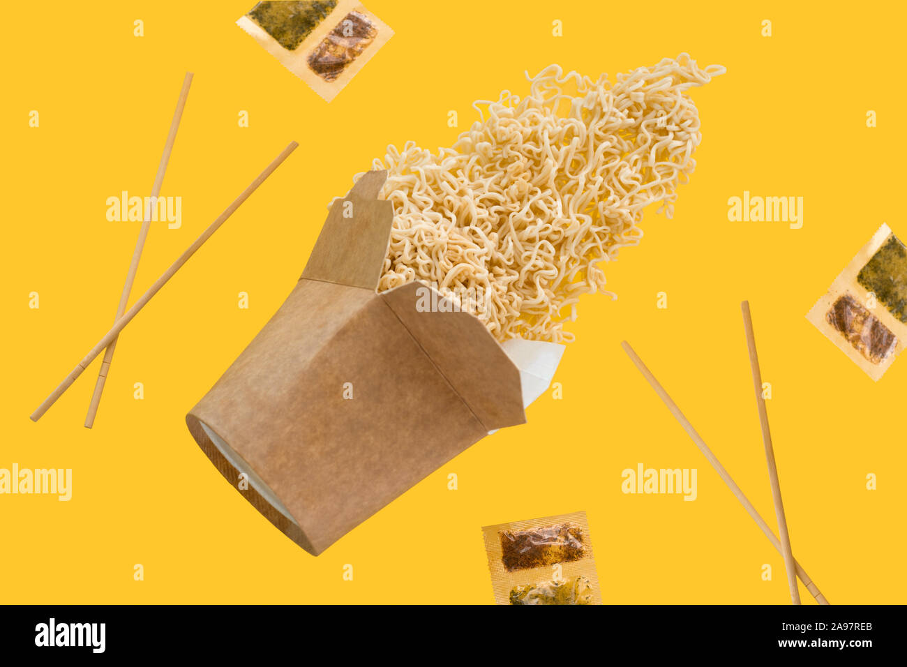Download Flying On A Yellow Background Cardboard Box Wooden Sticks Dry Instant Noodles And A Packet Of Spices Asian Fast Food Levitating On A Yellow Backgro Stock Photo Alamy Yellowimages Mockups