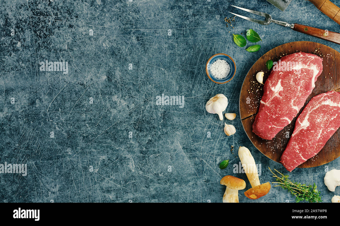 Top view of beef steaks with seasonings, 3d rendering Stock Photo