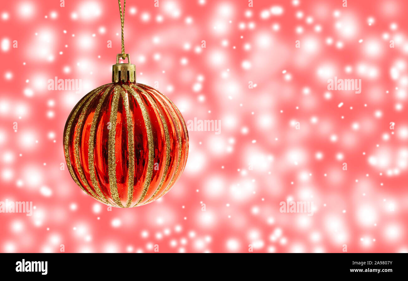 Red Christmas Ball With Gold Decoration And Blurry Bokeh Snow Flakes And Light Background Close Up Image With Copy Space Stock Photo Alamy