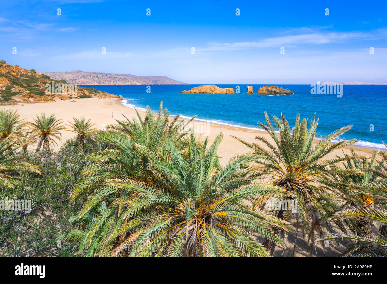 Scenic landscape of palm trees, turquoise water and tropical beach, Vai, Crete, Greece. Stock Photo