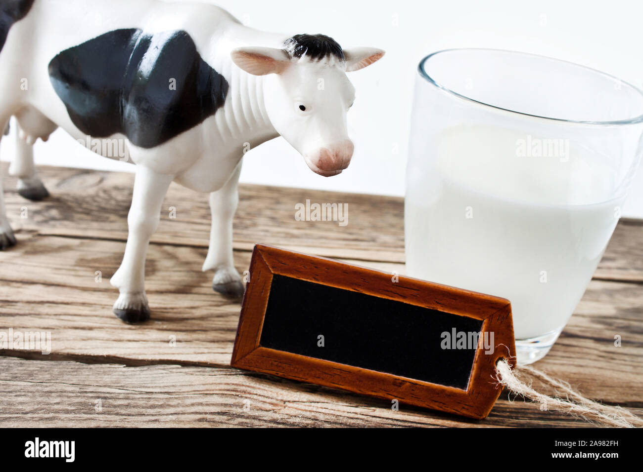 Concept milk and background label Stock Photo - Alamy