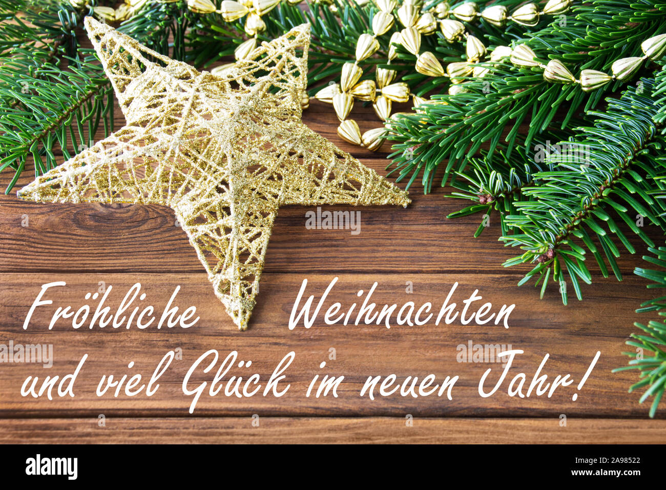 Frohe Weihnachten Merry Christmas and a Happy New Year Stock Photo - Alamy, image size:1300x956